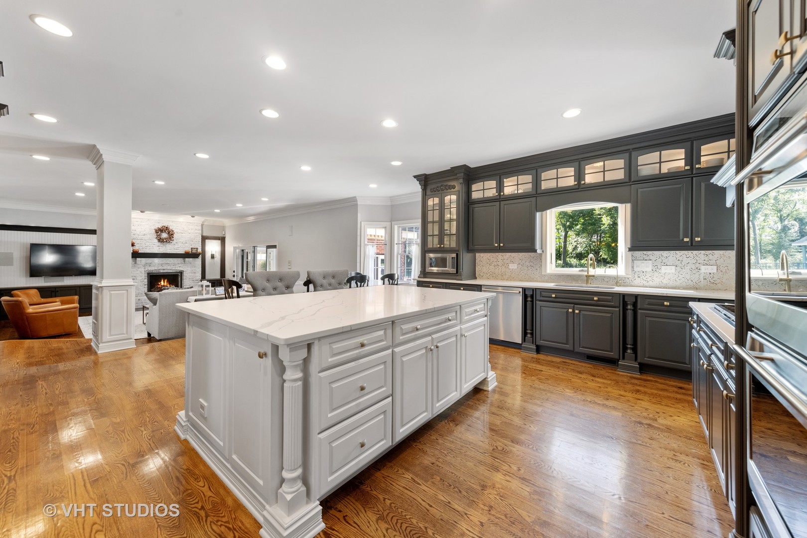 32W651 Honey Hill Circle Wayne, IL 60184 - Photo 11 of 49 a large kitchen with stainless steel appliances granite countertop a large counter top and a stove