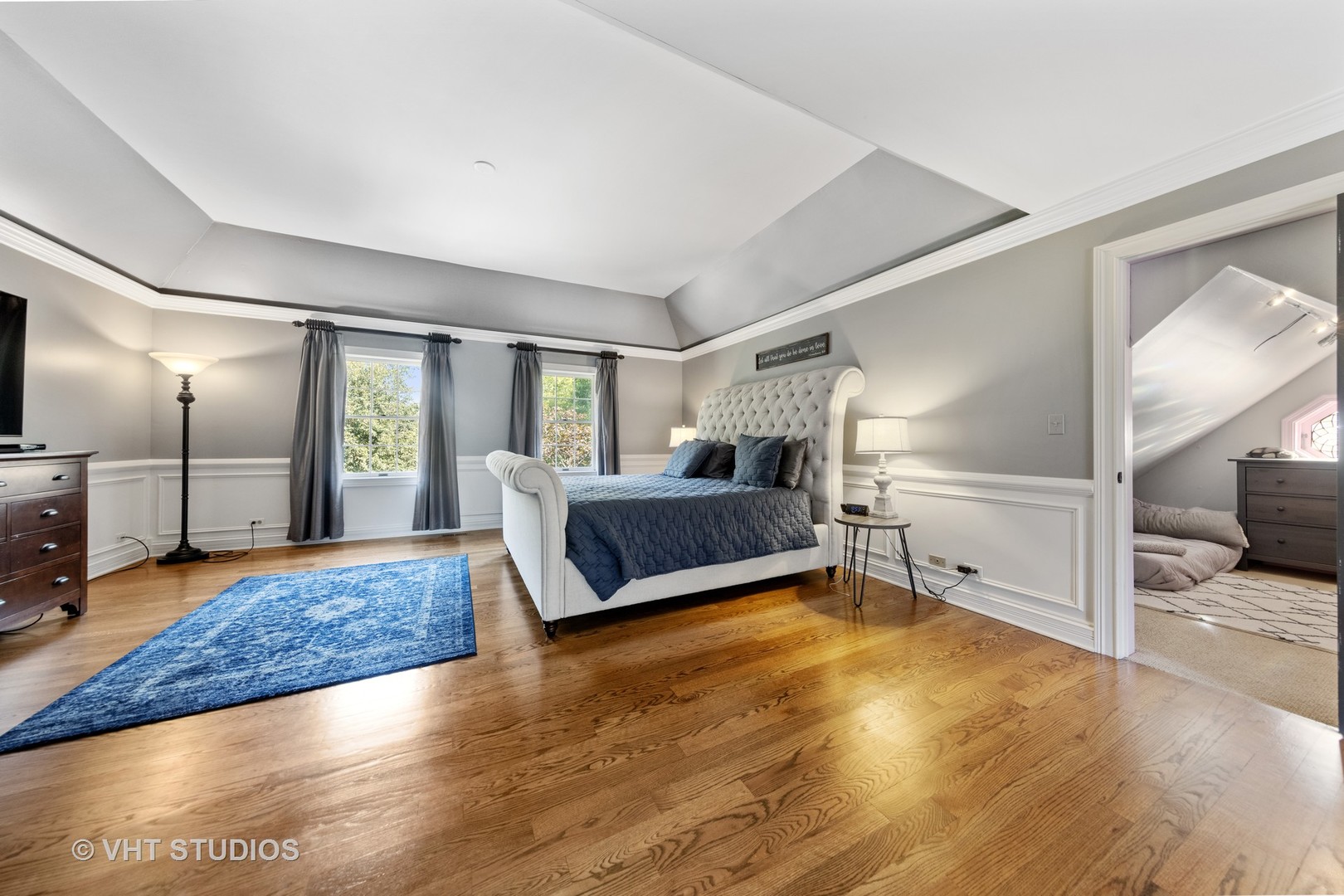 32W651 Honey Hill Circle Wayne, IL 60184 - Photo 17 of 49 a spacious bedroom with a bed and a television on desk