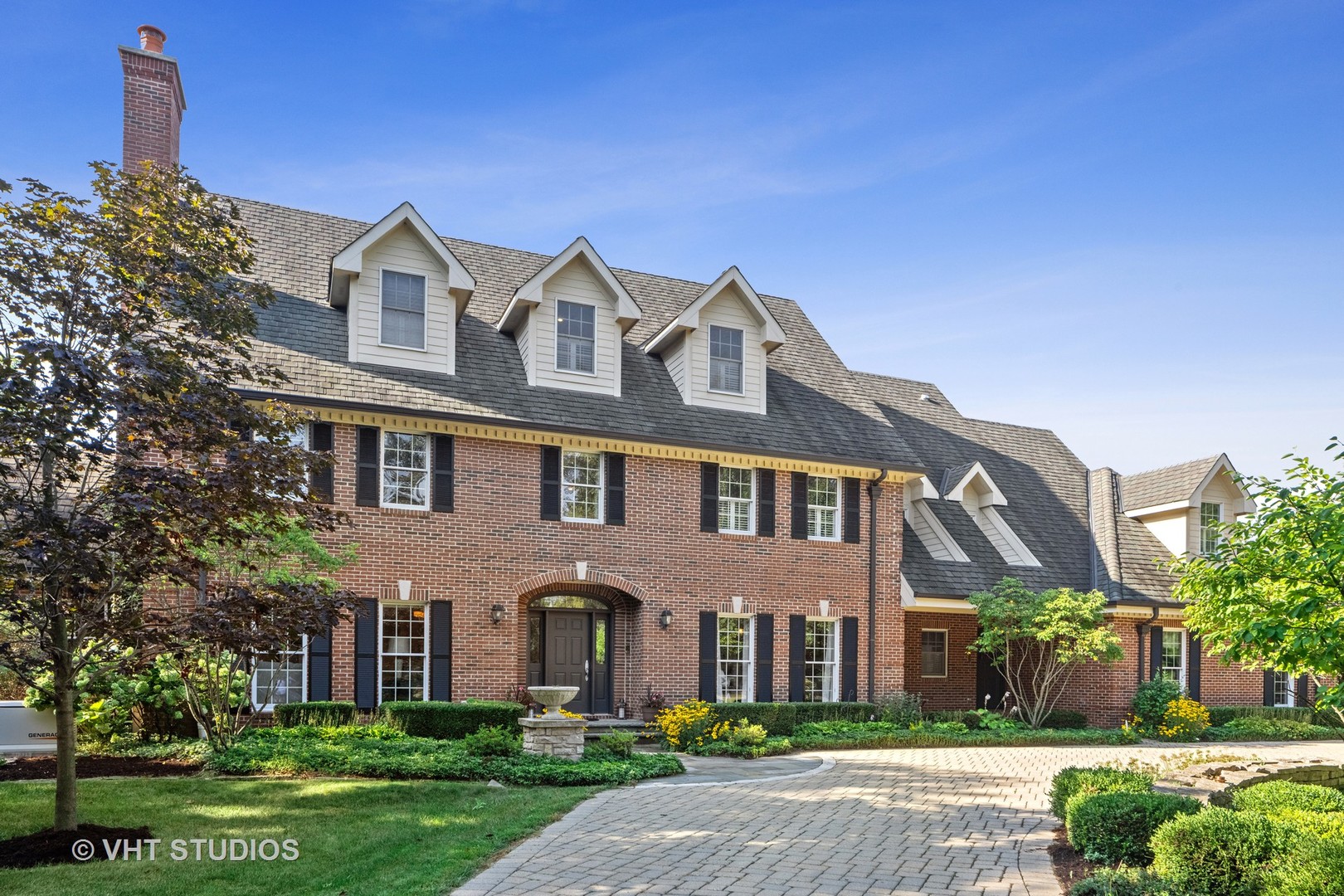 32W651 Honey Hill Circle Wayne, IL 60184 - Photo 2 of 49 a front view of a house with garden