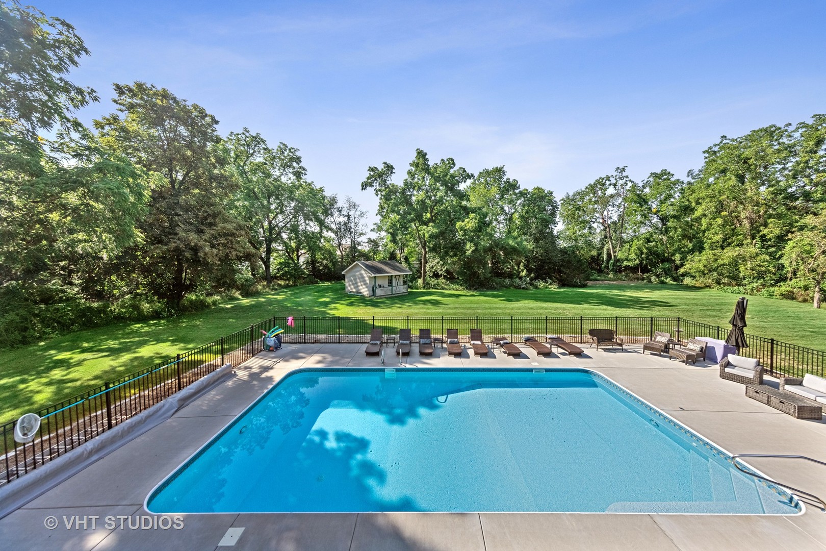 32W651 Honey Hill Circle Wayne, IL 60184 - Photo 21 of 49 a view of a swimming pool with a outdoor seating