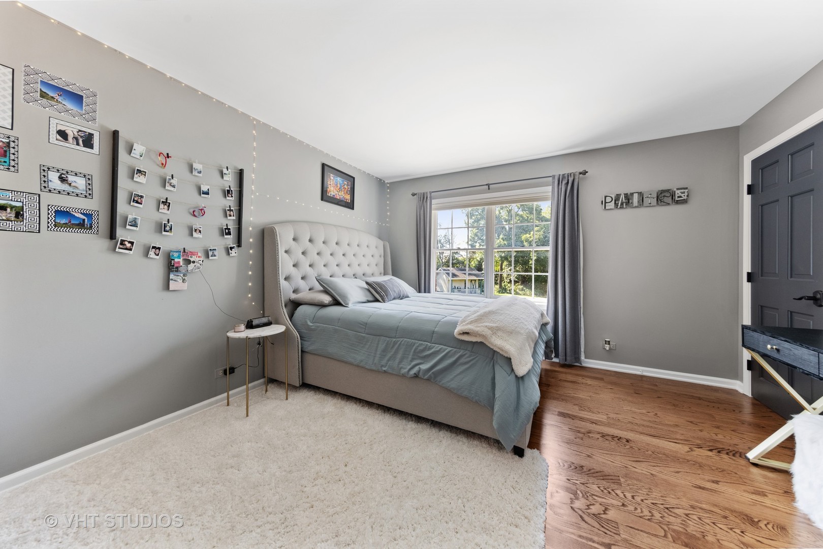 32W651 Honey Hill Circle Wayne, IL 60184 - Photo 25 of 49 a bedroom with a bed wooden floor and window