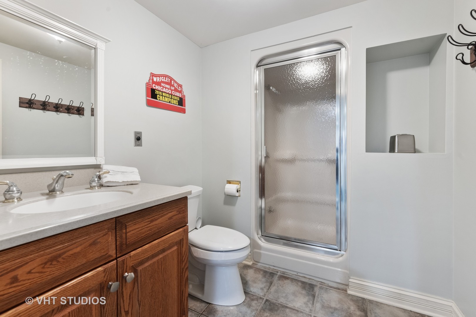 32W651 Honey Hill Circle Wayne, IL 60184 - Photo 33 of 49 a bathroom with a granite countertop toilet sink and shower