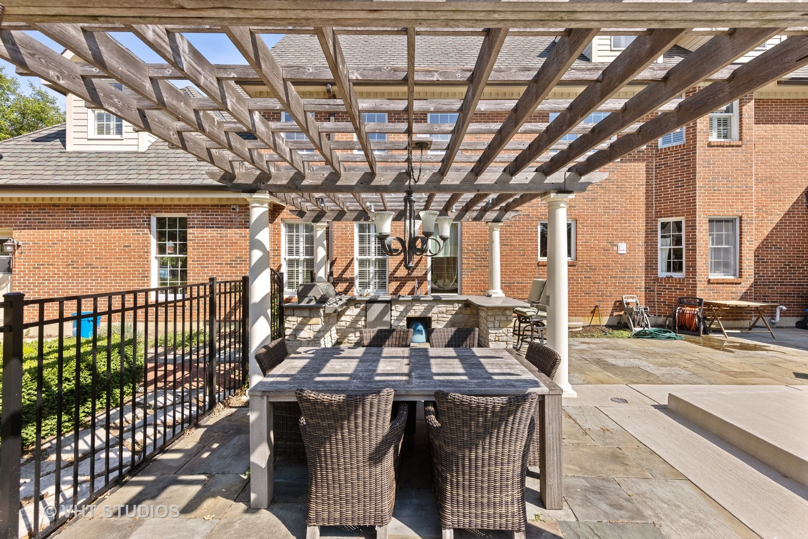 32W651 Honey Hill Circle Wayne, IL 60184 - Photo 38 of 49 a view of a porch with a table and chairs