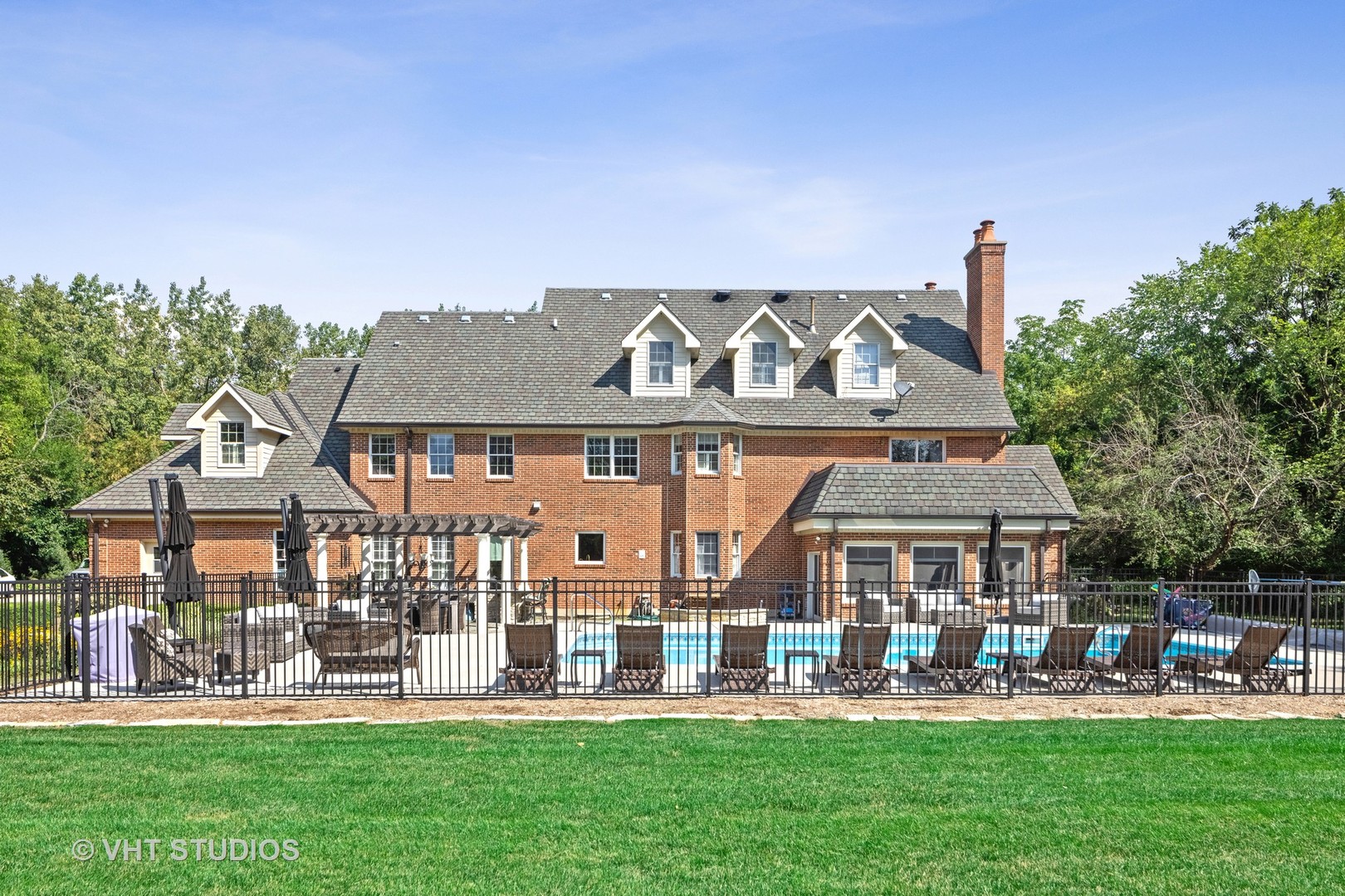 32W651 Honey Hill Circle Wayne, IL 60184 - Photo 43 of 49 a front view of a house with garden and trees