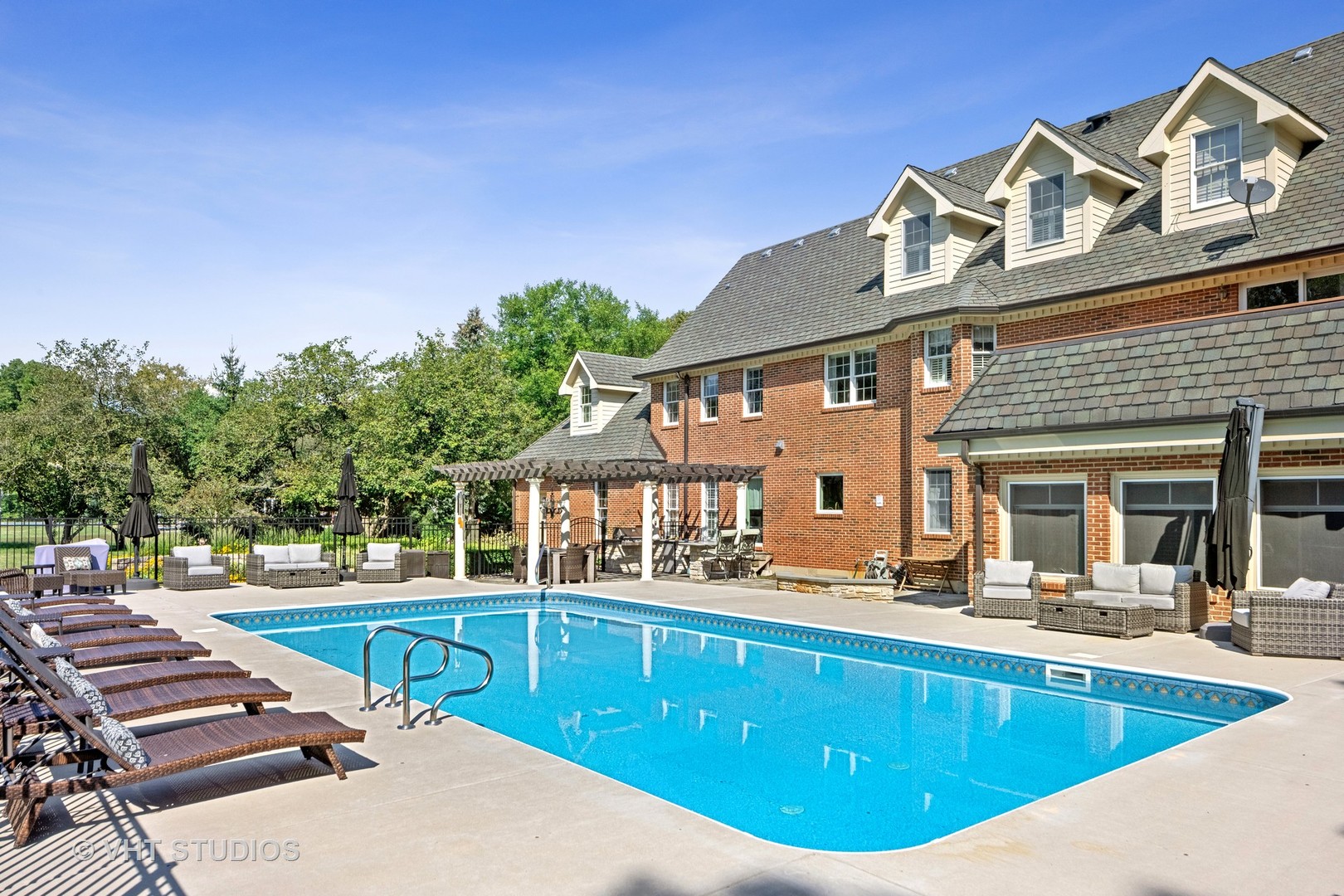 32W651 Honey Hill Circle Wayne, IL 60184 - Photo 44 of 49 a view of a house with pool and chairs