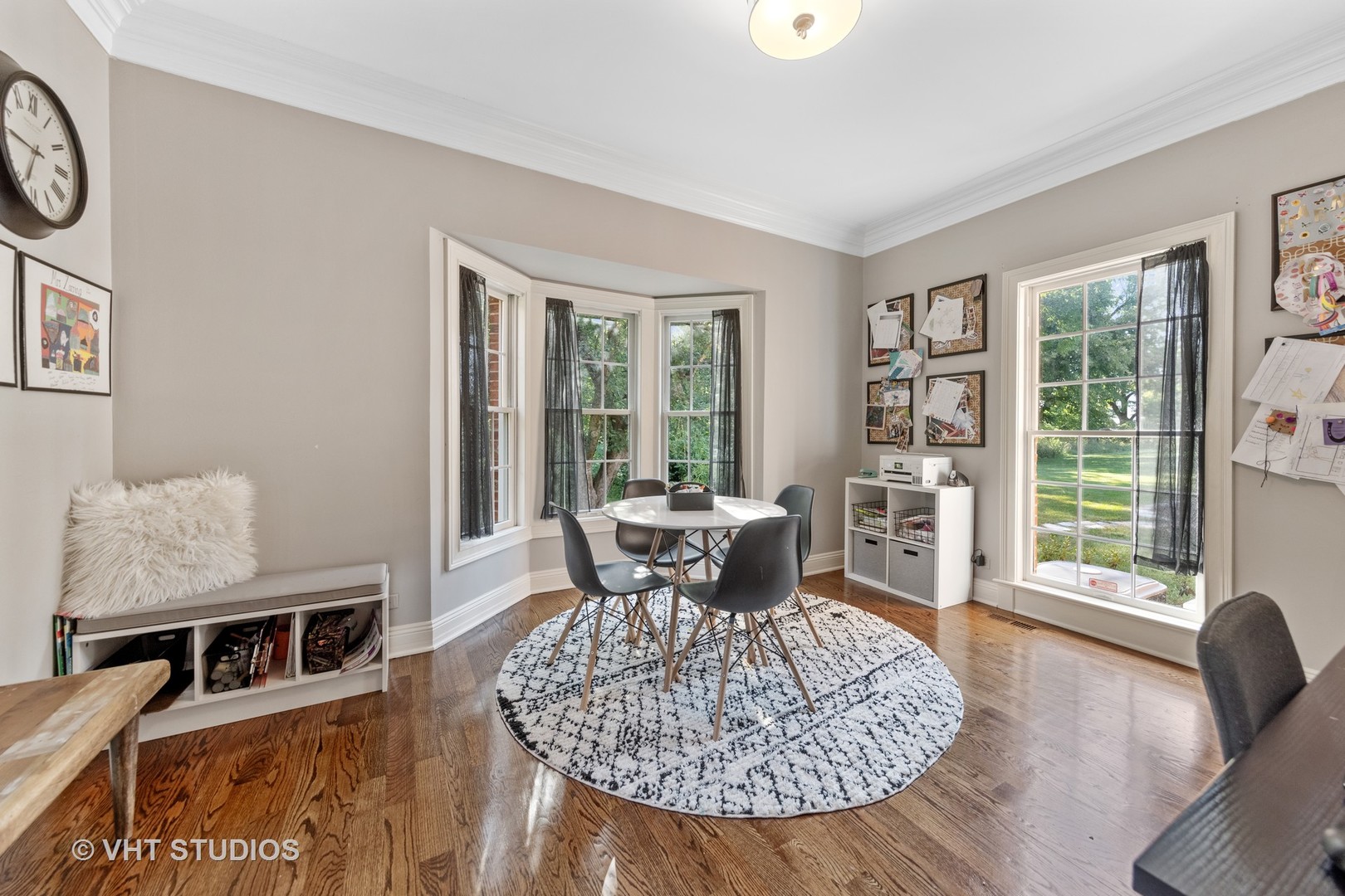 32W651 Honey Hill Circle Wayne, IL 60184 - Photo 6 of 49 a dining room with furniture a rug and wooden floor