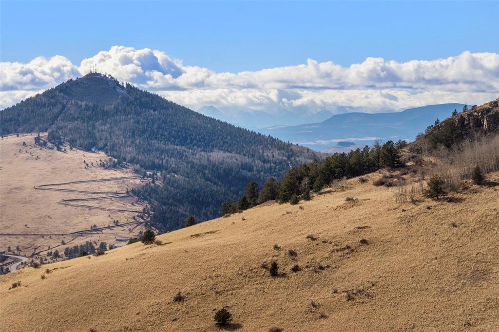 Private Road Cripple Creek, CO 80813 - Photo 15 of 19 a view of a dry yard with wooden fence