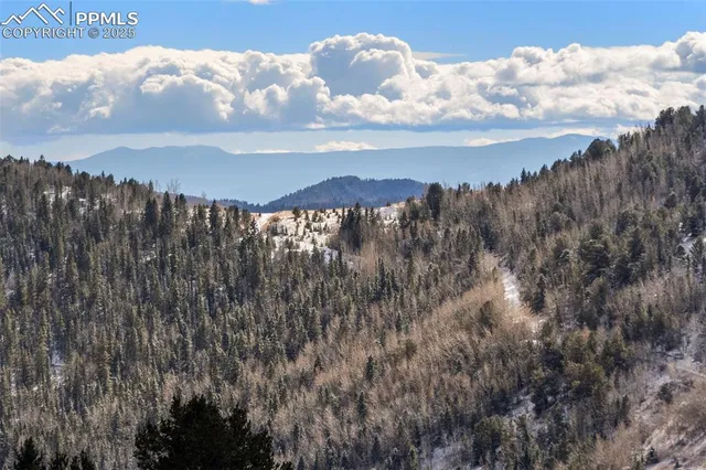 a view of lake with mountain