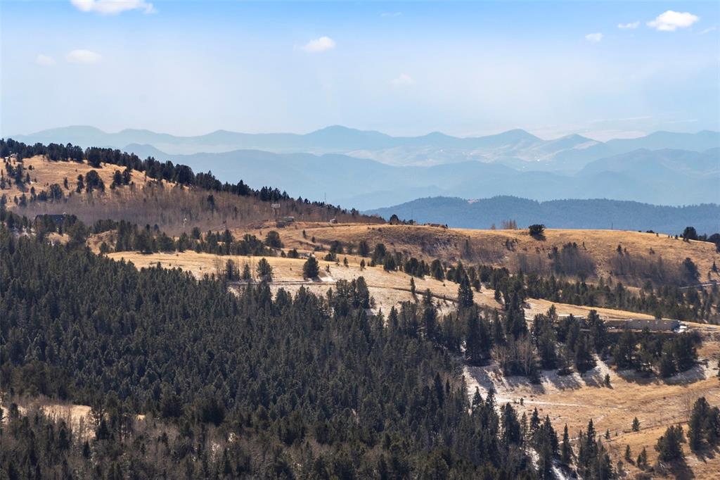 Private Road Cripple Creek, CO 80813 - Photo 18 of 19 a view of lake with mountain