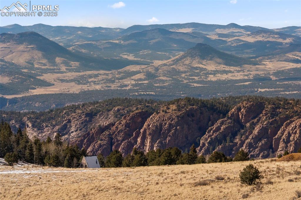 Private Road Cripple Creek, CO 80813 - Photo 19 of 19 a view of a yard with mountains in the background
