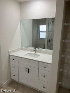 801 Southwest Raintree Boulevard LaBelle, FL 33935 - Photo 11 of 15 a bathroom with a granite countertop sink and a mirror