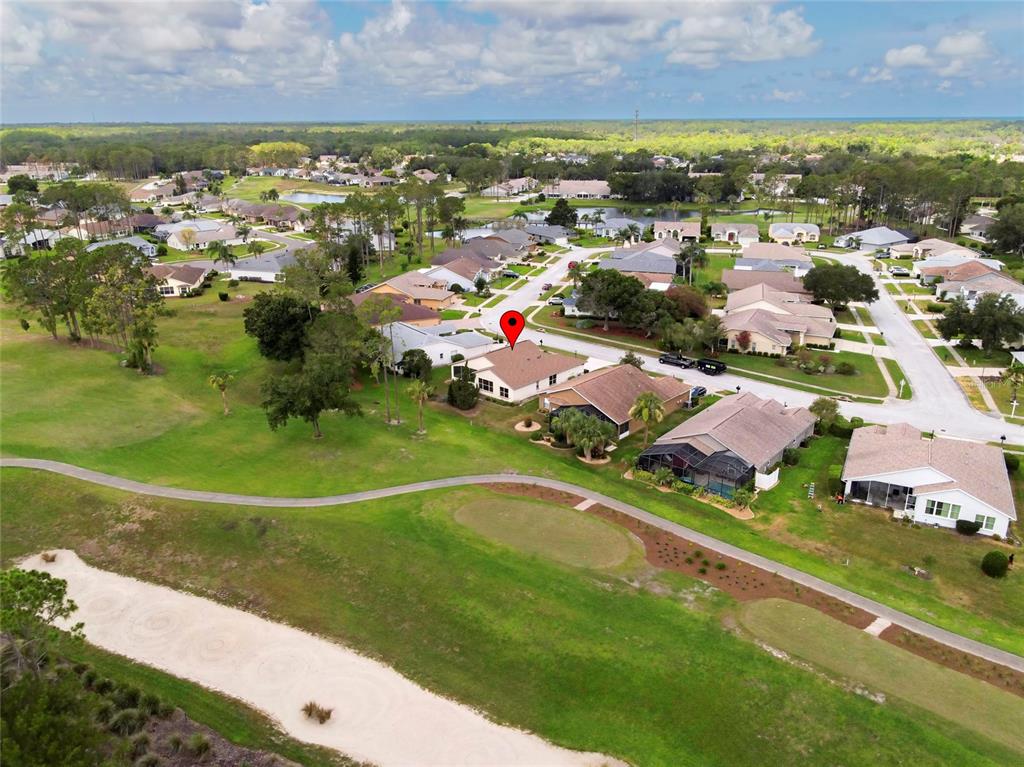 11228 Windrush Circle Hudson, FL 34667 - Photo 49 of 67 an aerial view of residential houses with outdoor space