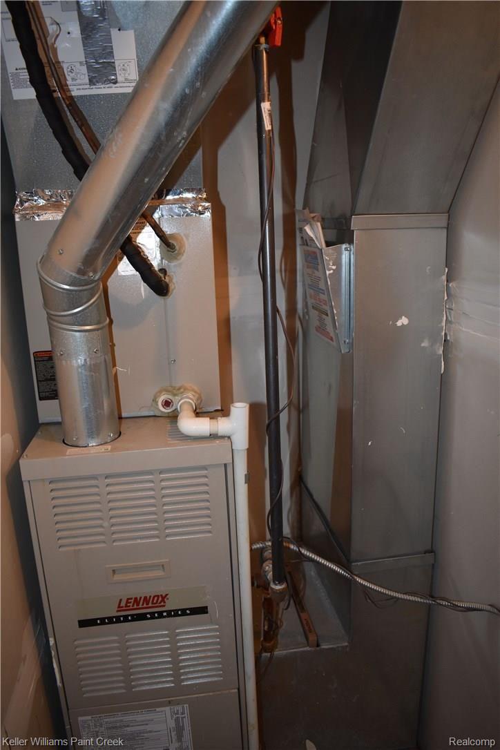 1885 Flagstone Circle Rochester, MI 48307 - Photo 8 of 32 THE GAS FORCED AIR FURNACE IS EQUIPPED WITH CENTRAL AIR
