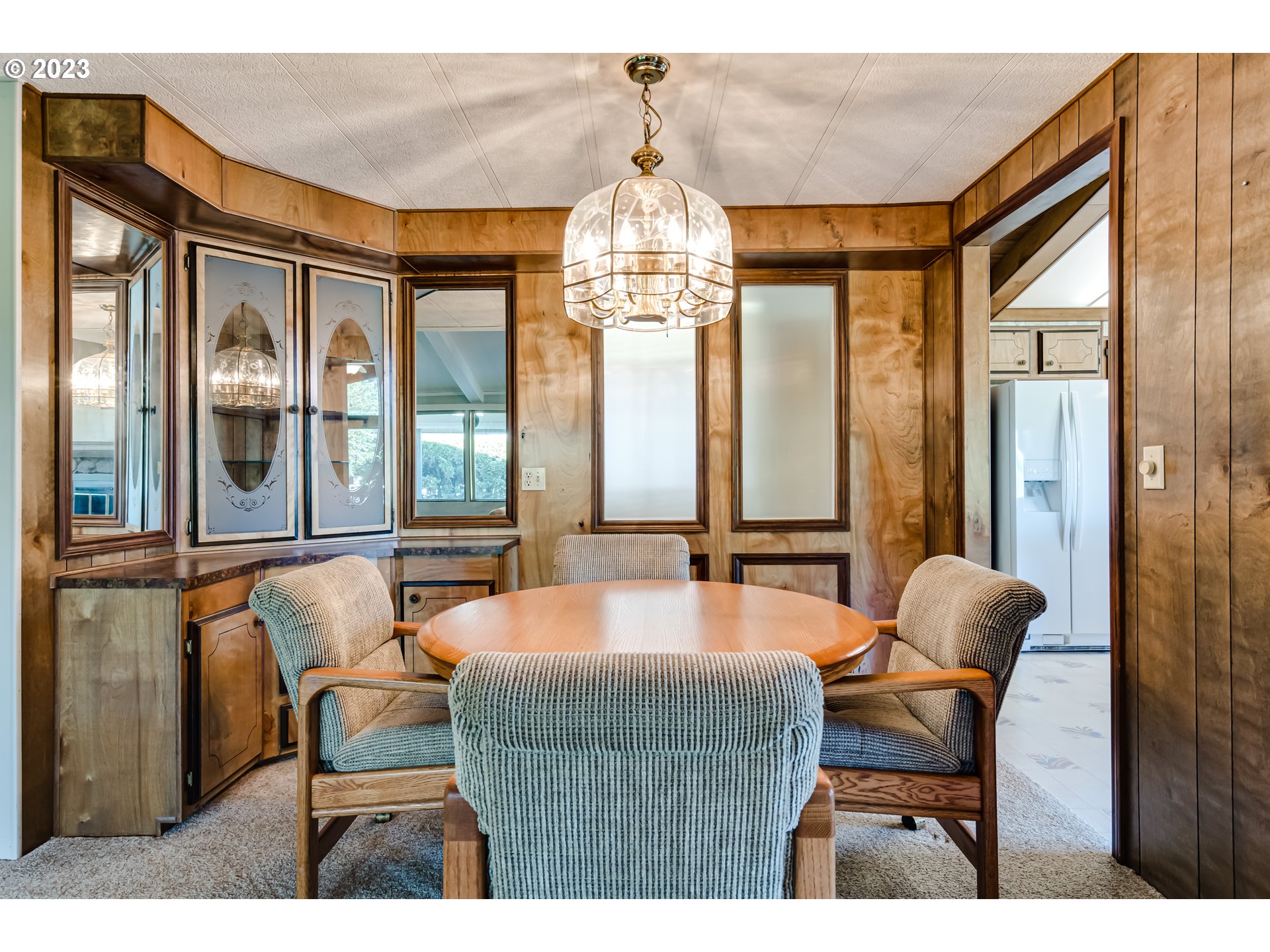 34637 Devonshire Drive Eugene, OR 97405 - Photo 13 of 37 a dining room with furniture and large windows