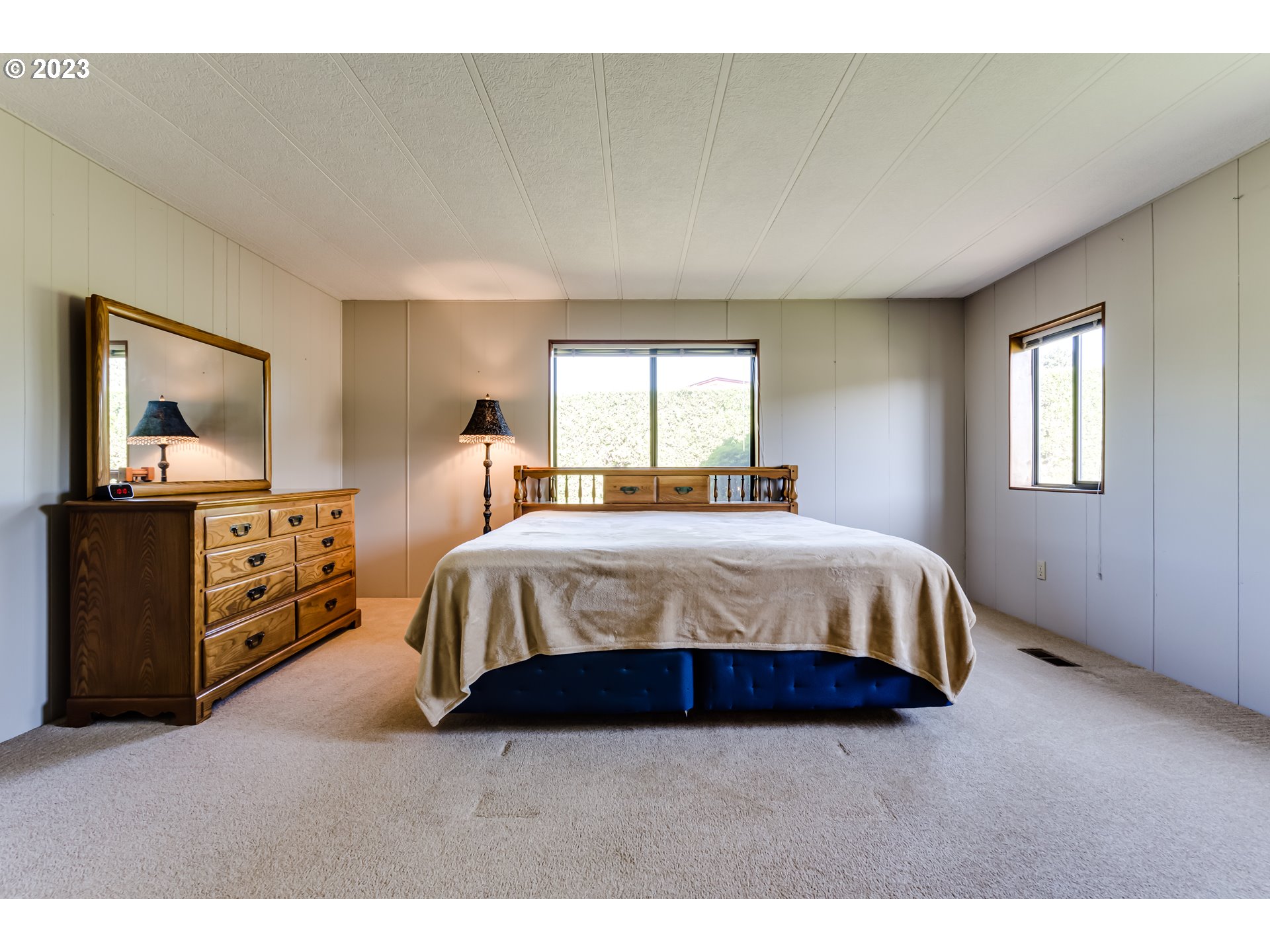 34637 Devonshire Drive Eugene, OR 97405 - Photo 18 of 37 a bedroom with a bed and window