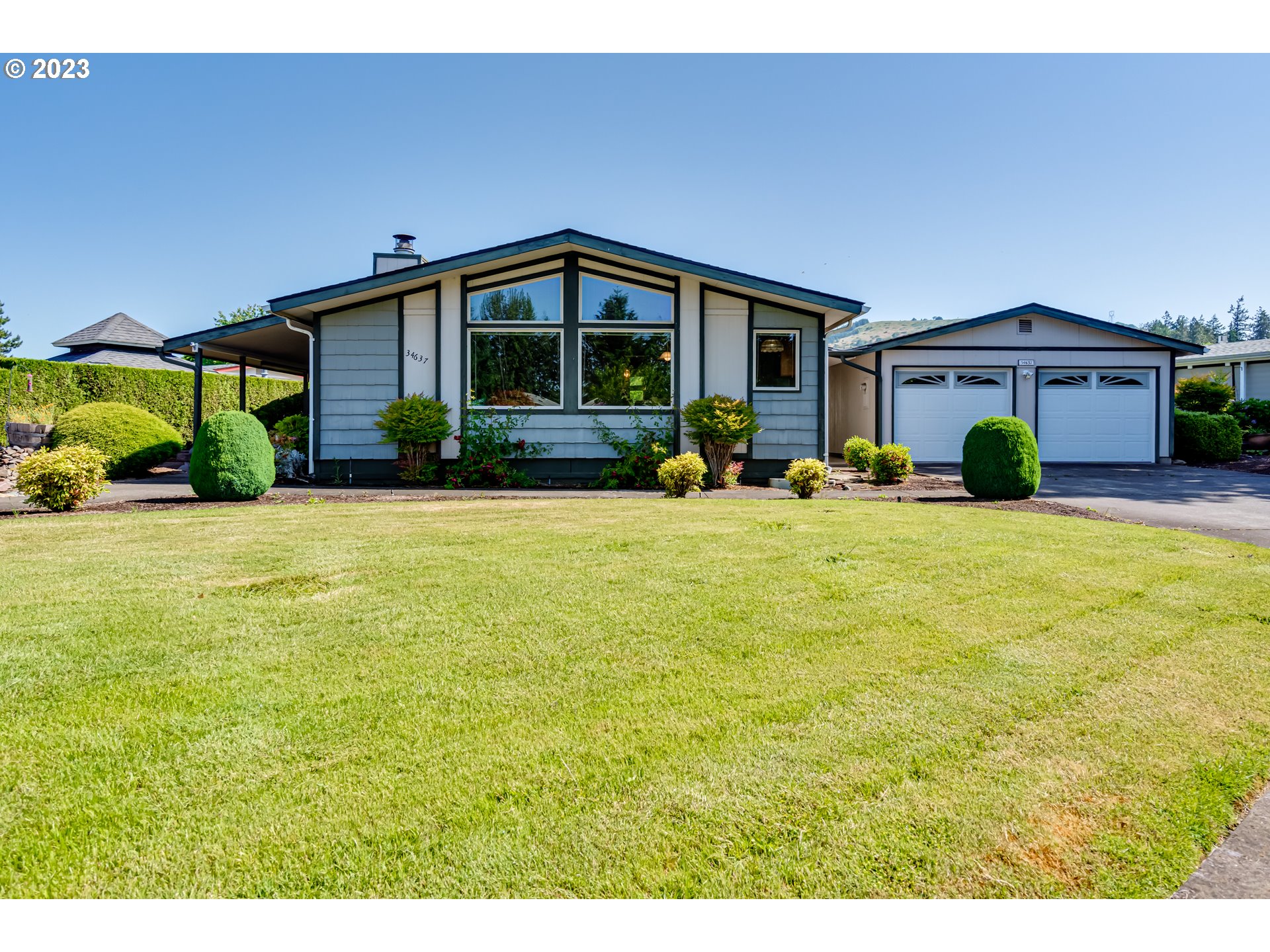34637 Devonshire Drive Eugene, OR 97405 - Photo 2 of 37 a view of a house with a yard