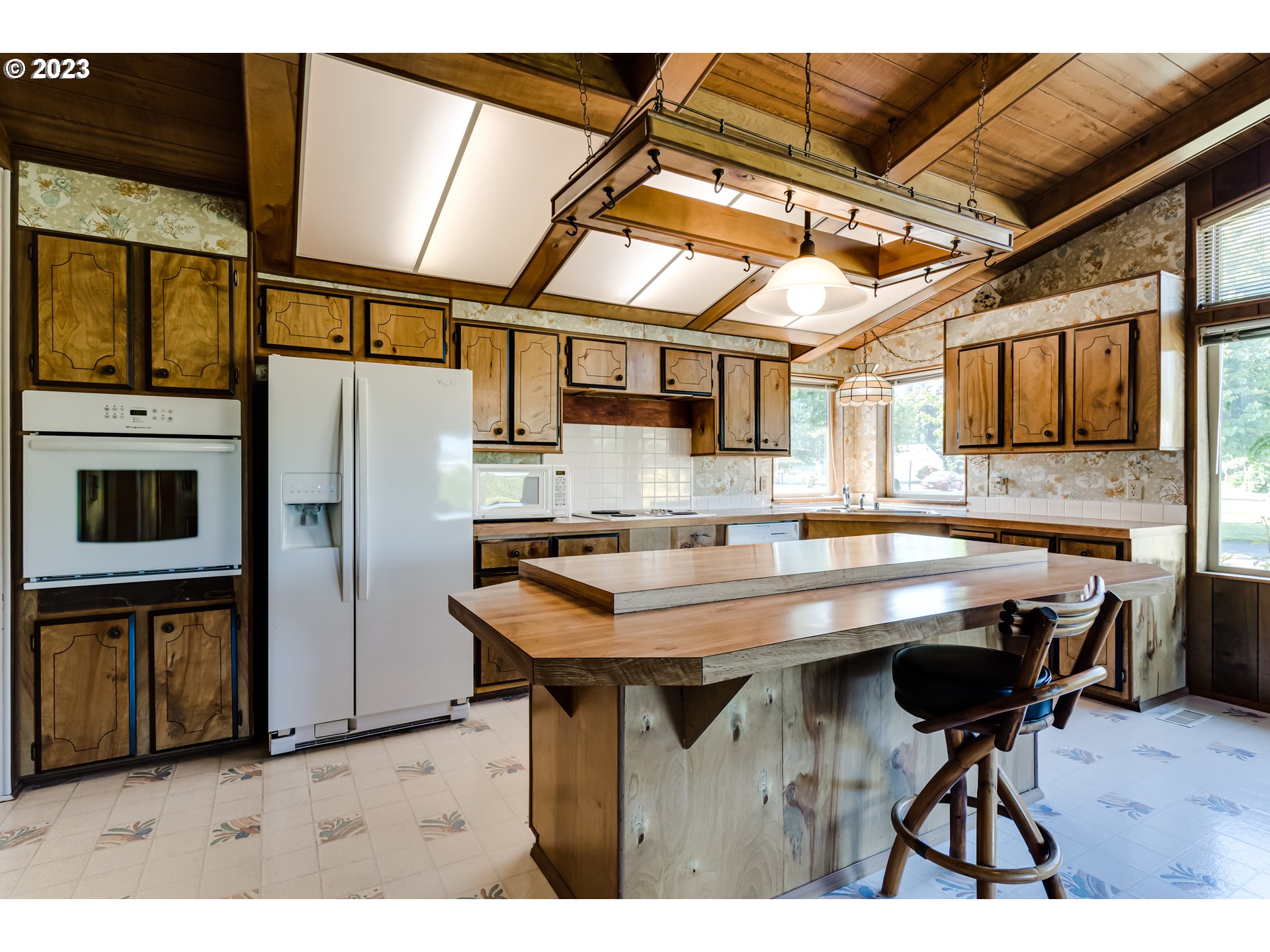 34637 Devonshire Drive Eugene, OR 97405 - Photo 6 of 37 a dining table chair next to a window