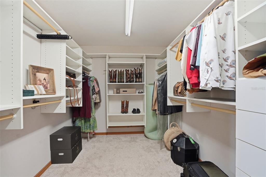 18610 Townsend House Road Dade City, FL 33523 - Photo 45 of 93 a view of walk in closet with clothes and shoes