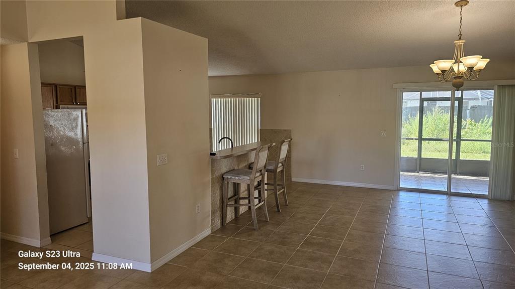 33 Fenwick Lane Palm Coast, FL 32137 - Photo 3 of 16 a view of a room with furniture and a window
