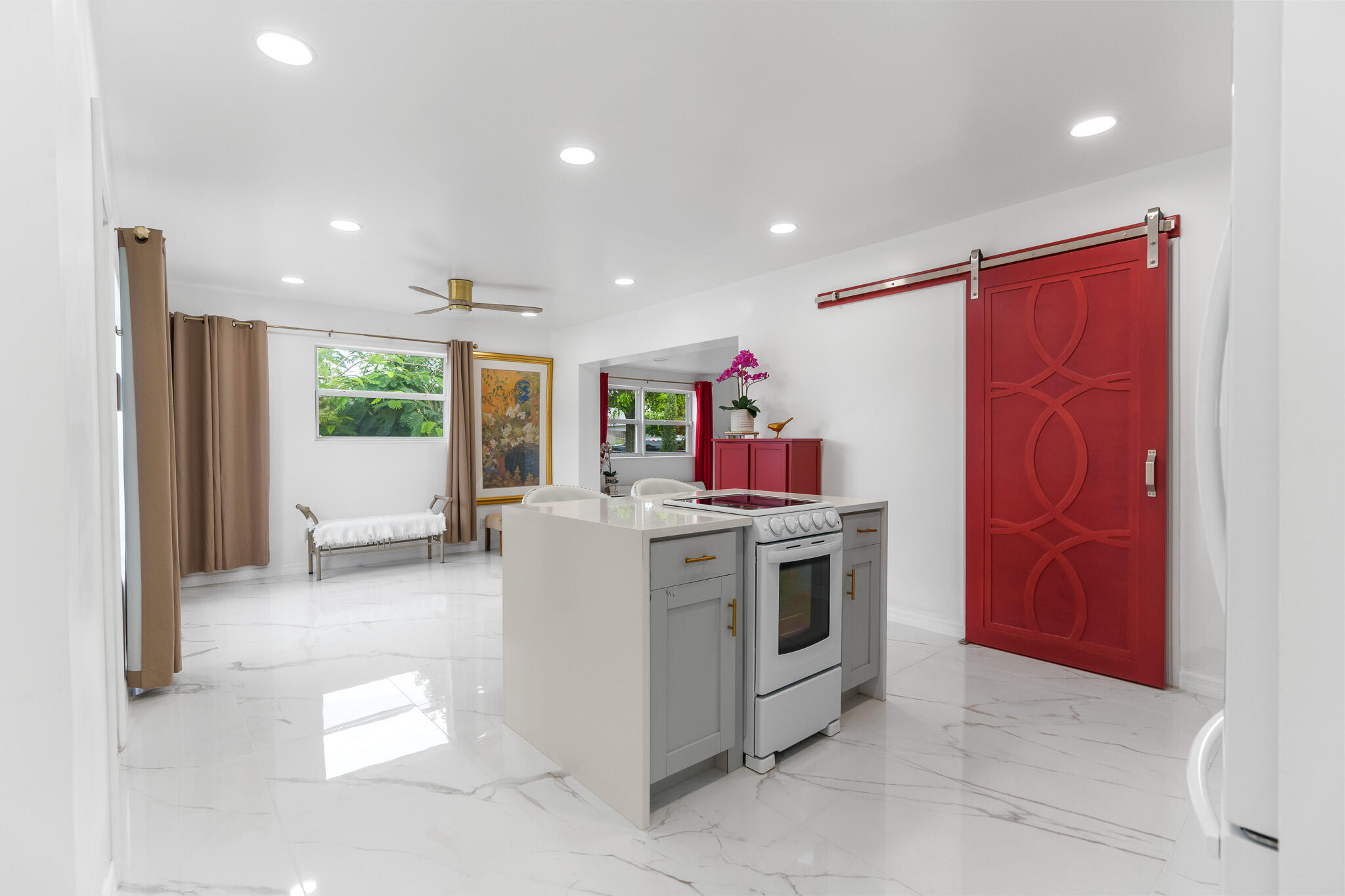 201 Northeast 28th Court Boynton Beach, FL 33435 - Photo 11 of 48 a kitchen with stainless steel appliances granite countertop a stove and a refrigerator