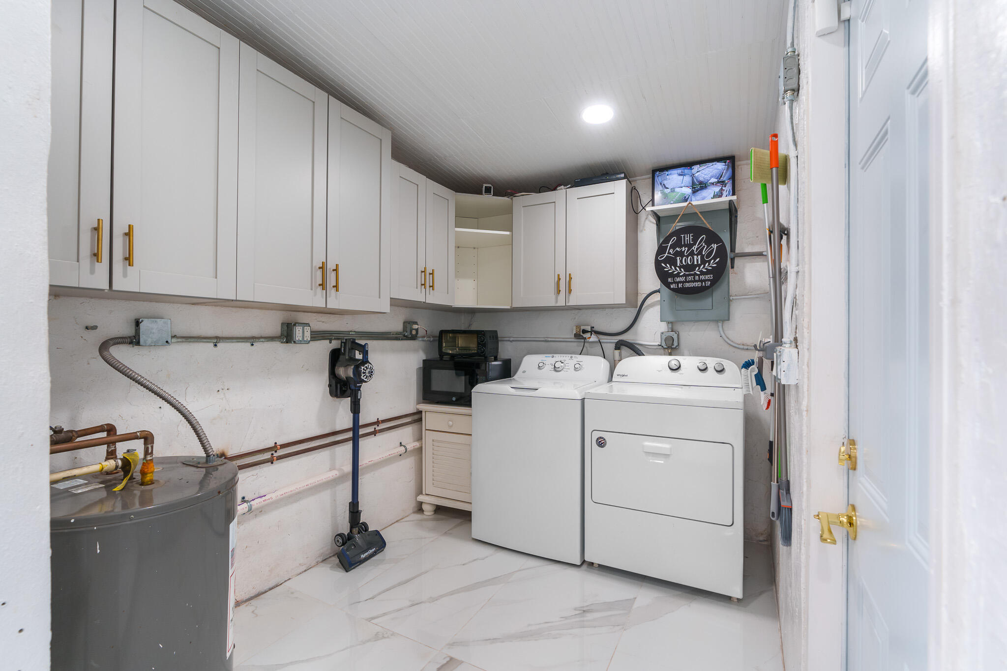 201 Northeast 28th Court Boynton Beach, FL 33435 - Photo 16 of 48 a utility room with dryer and washer