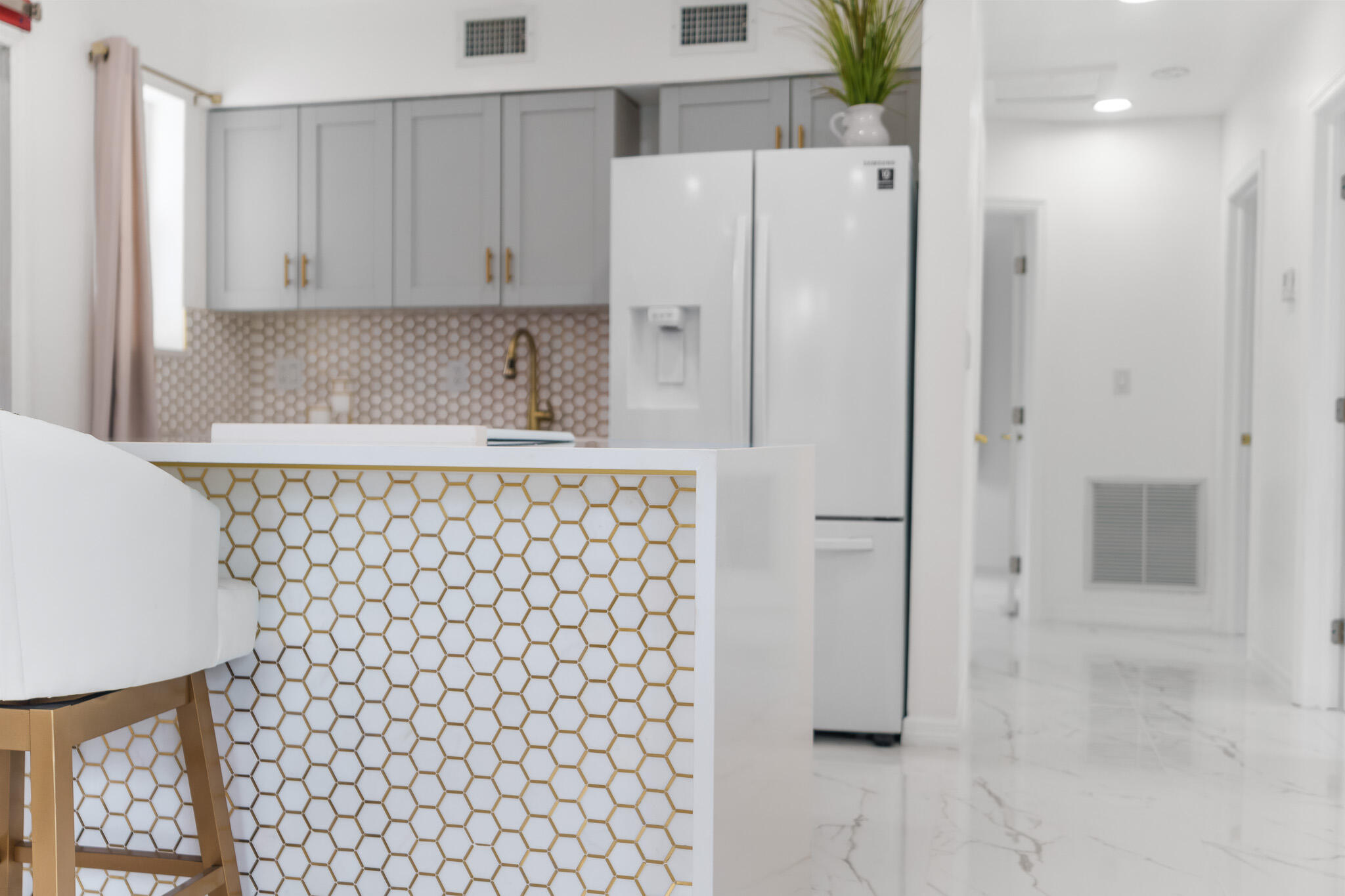 201 Northeast 28th Court Boynton Beach, FL 33435 - Photo 19 of 48 a white refrigerator freezer sitting inside of a kitchen