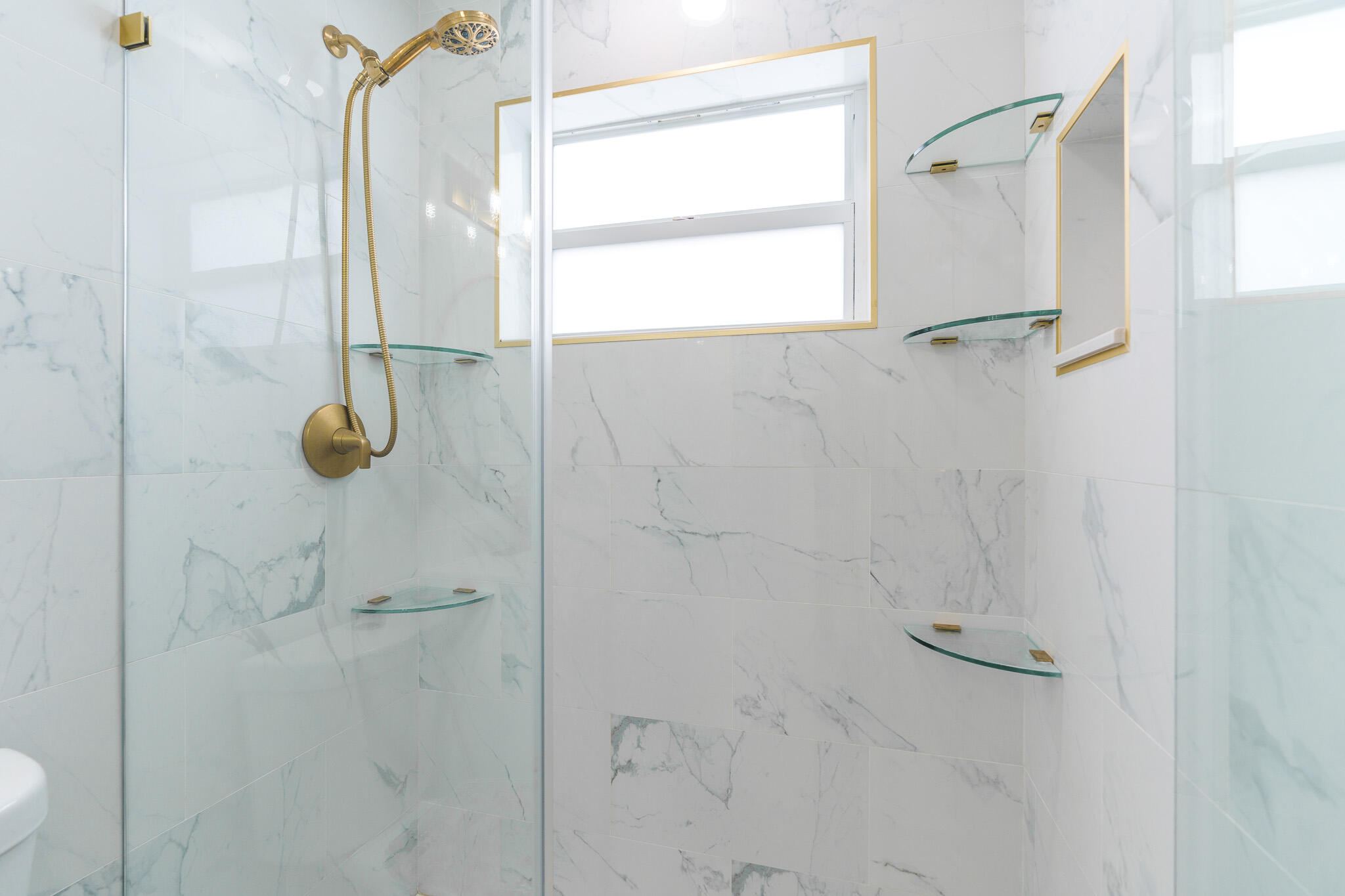 201 Northeast 28th Court Boynton Beach, FL 33435 - Photo 23 of 48 a bathroom with a shower