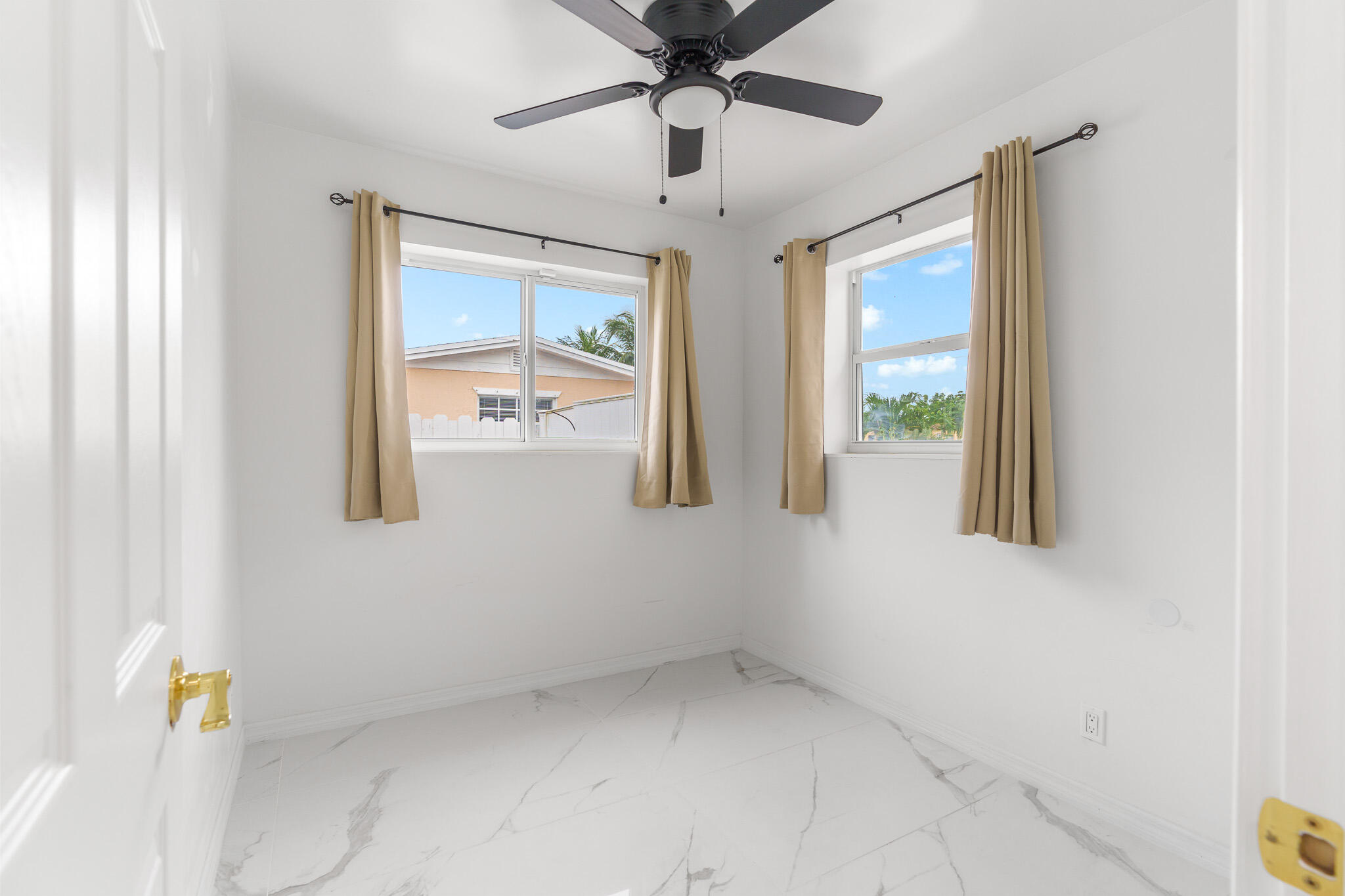 201 Northeast 28th Court Boynton Beach, FL 33435 - Photo 27 of 48 a view of an empty room with a window