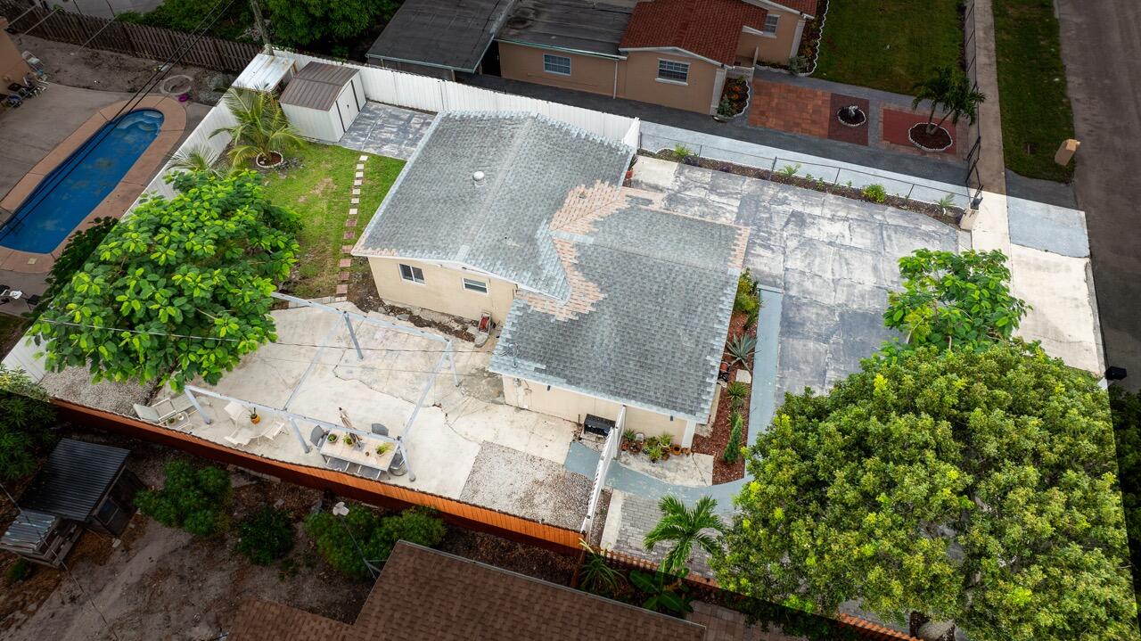 201 Northeast 28th Court Boynton Beach, FL 33435 - Photo 48 of 48 an aerial view of a house with a yard and garden