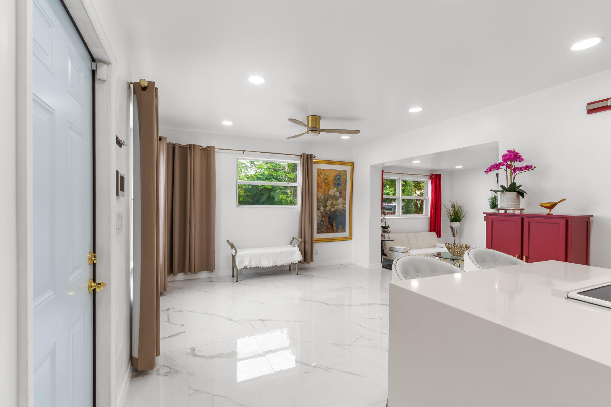 201 Northeast 28th Court Boynton Beach, FL 33435 - Photo 9 of 48 a lobby with furniture and window