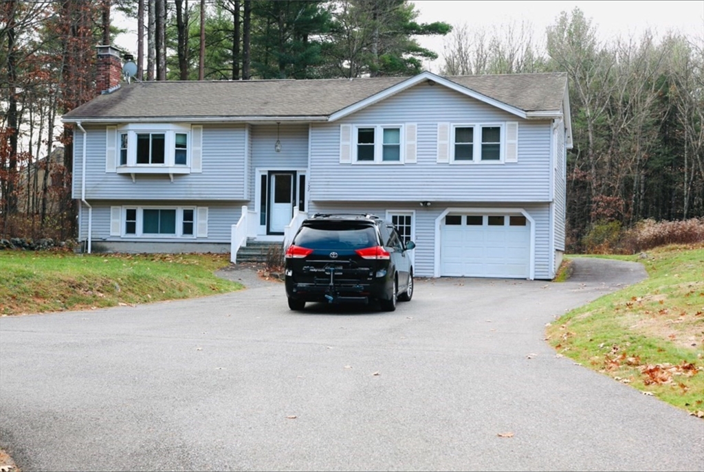 a car parked in front of a house