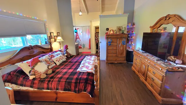 a bathroom with a sink vanity tub and shower