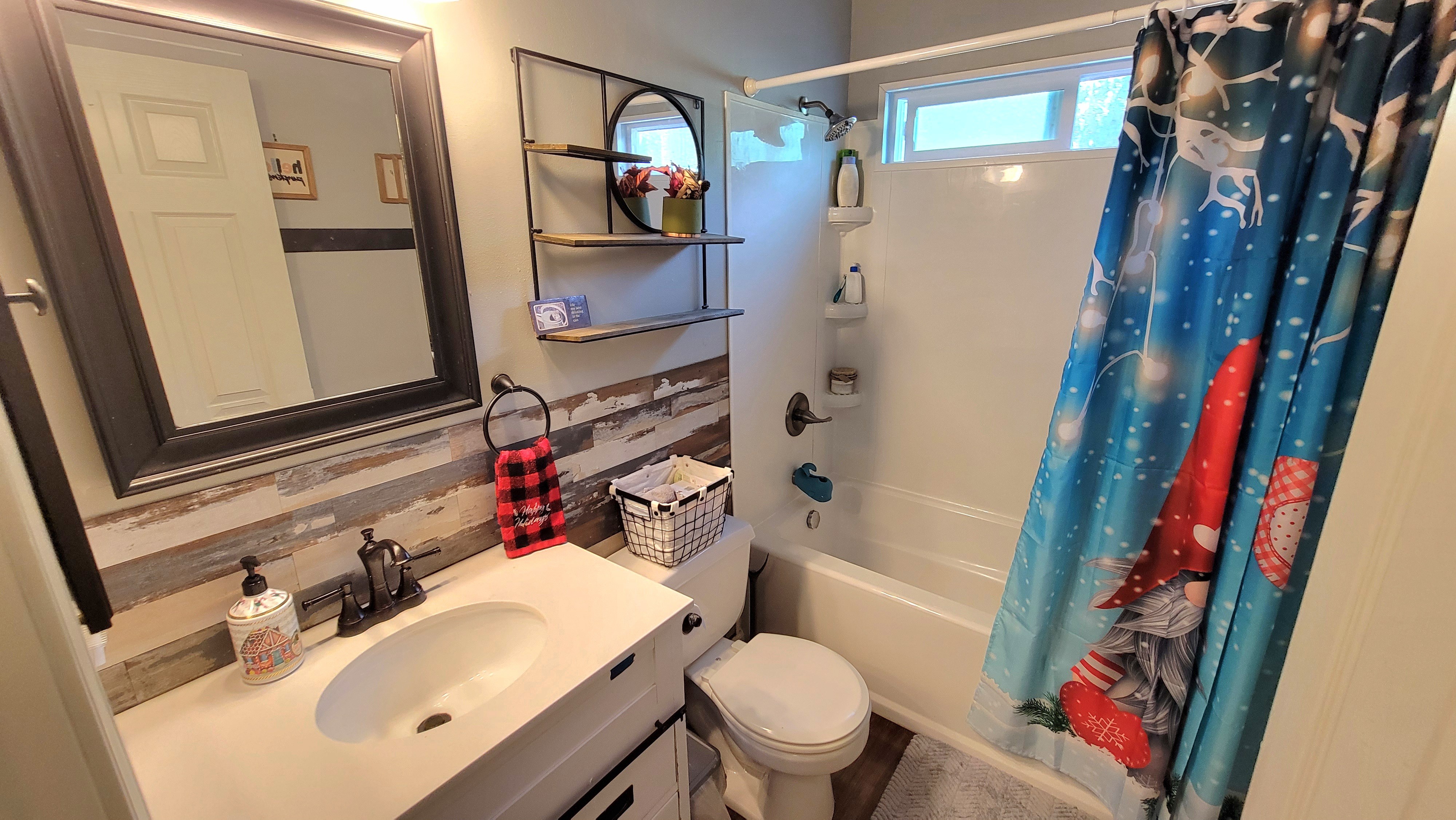 78-1392 Bishop Road Holualoa, HI 96725 - Photo 16 of 30 a bathroom with a sink toilet and shower