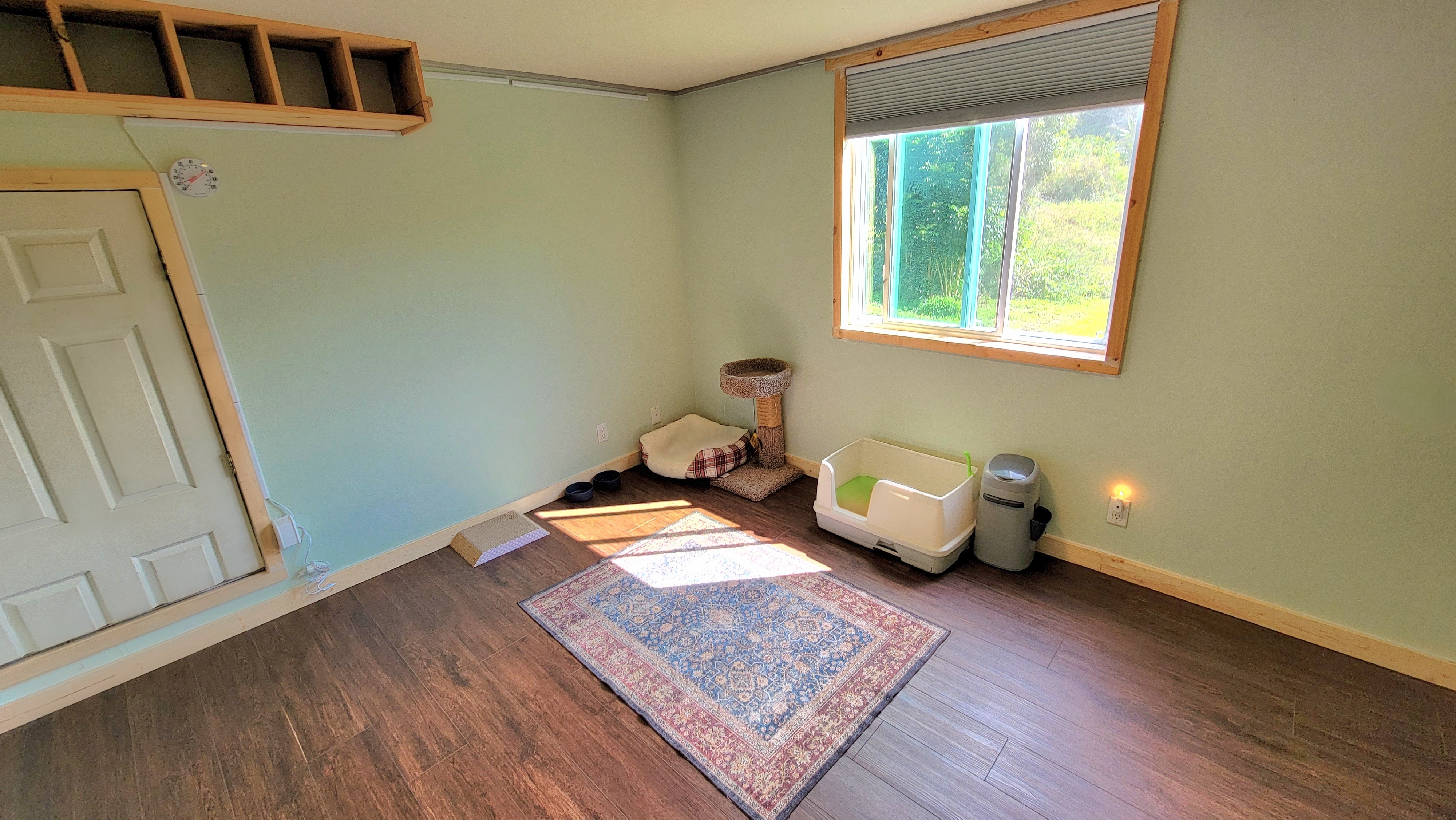 78-1392 Bishop Road Holualoa, HI 96725 - Photo 21 of 30 a bedroom with a bed and wooden floor