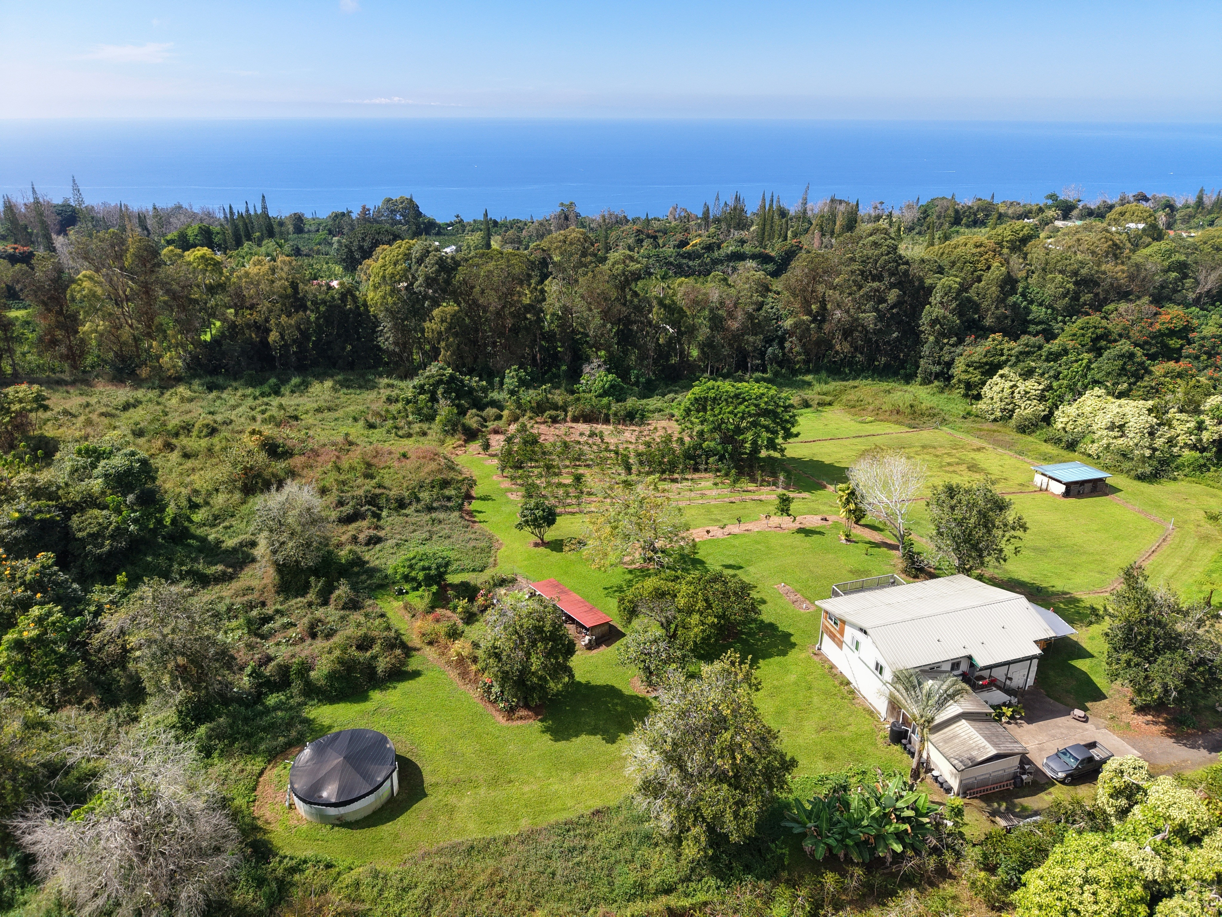 78-1392 Bishop Road Holualoa, HI 96725 - Photo 3 of 30 a view of a lake with mountains in the background