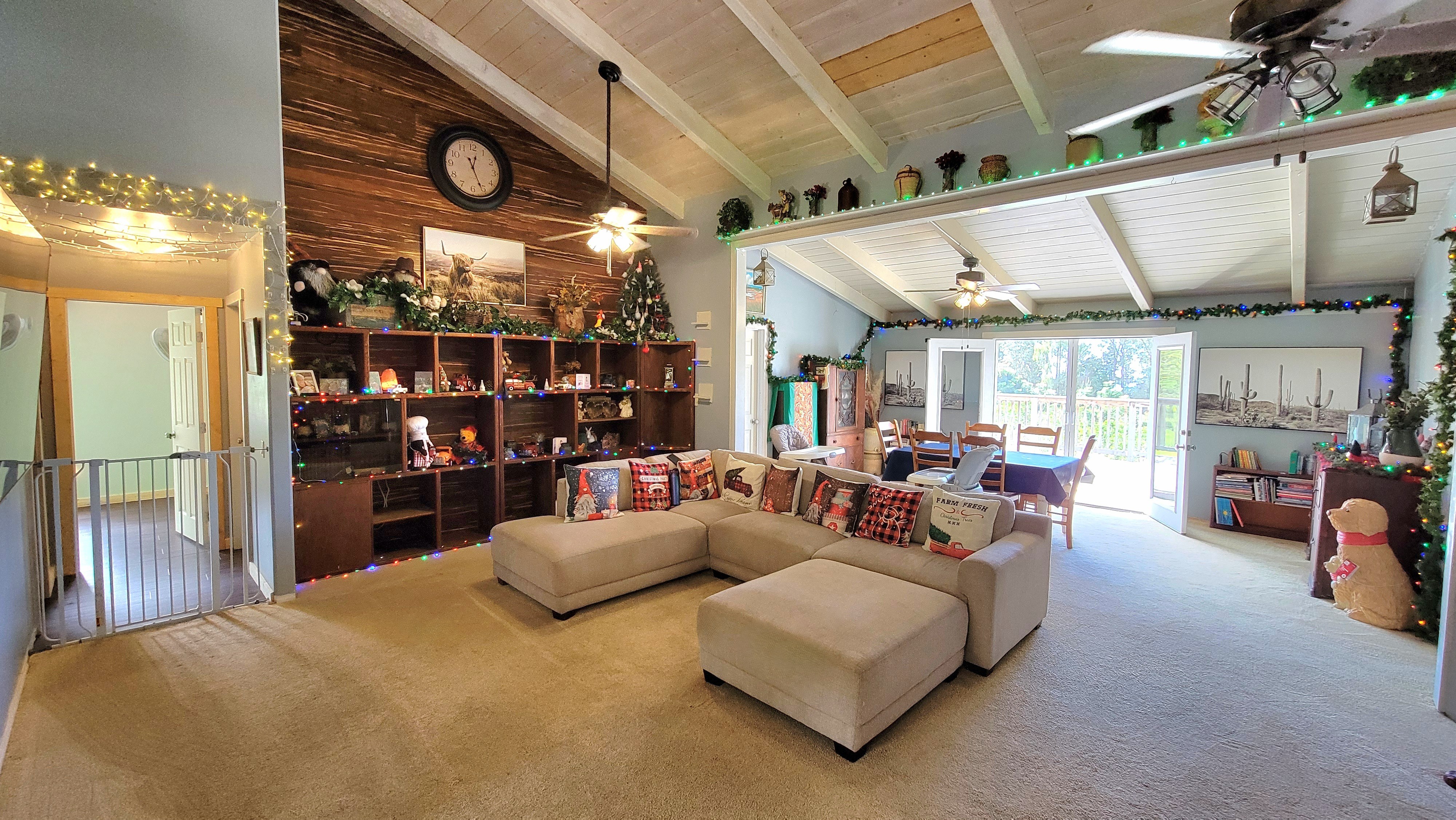78-1392 Bishop Road Holualoa, HI 96725 - Photo 5 of 30 a living room with furniture and a large window