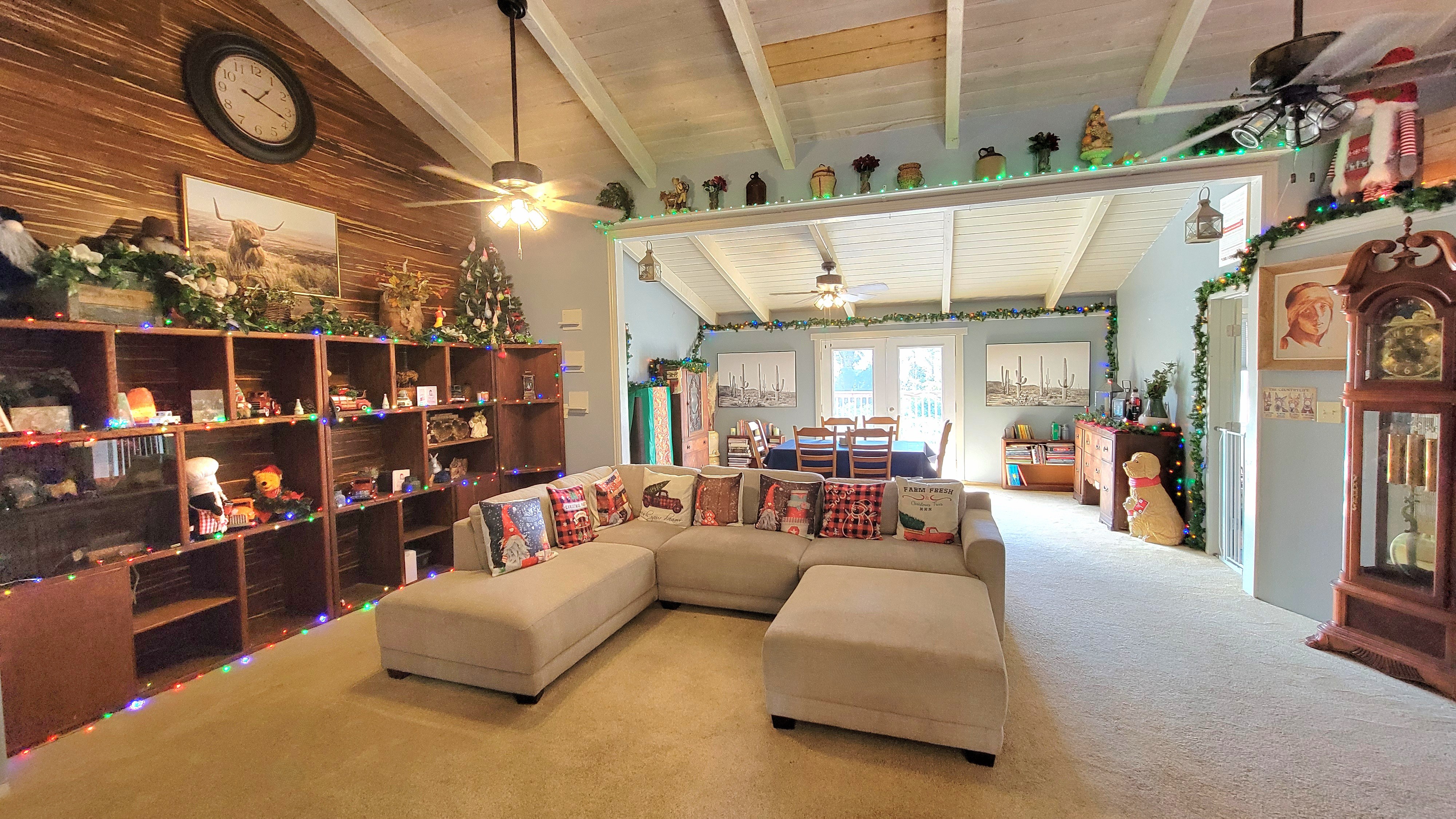 78-1392 Bishop Road Holualoa, HI 96725 - Photo 6 of 30 a living room with furniture and a large window