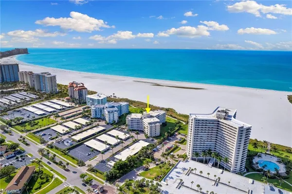 a view of city with ocean