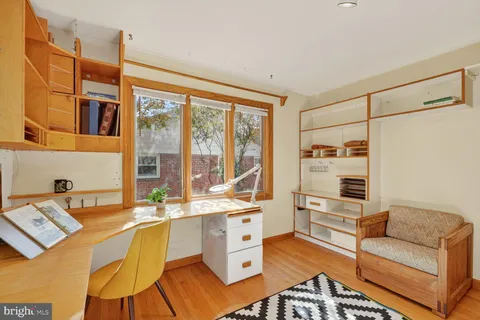 a very nice looking living room with a large window