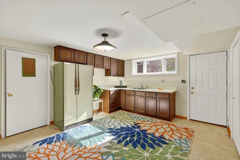 a bedroom with a bed and cabinets