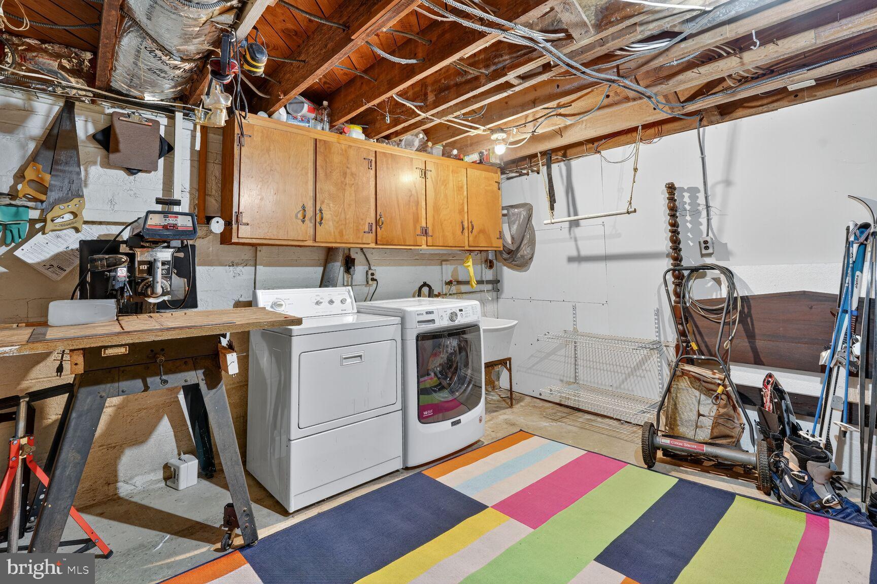 10407 Royal Road Silver Spring, MD 20903 - Photo 28 of 33 a utility room with sink dryer and washer