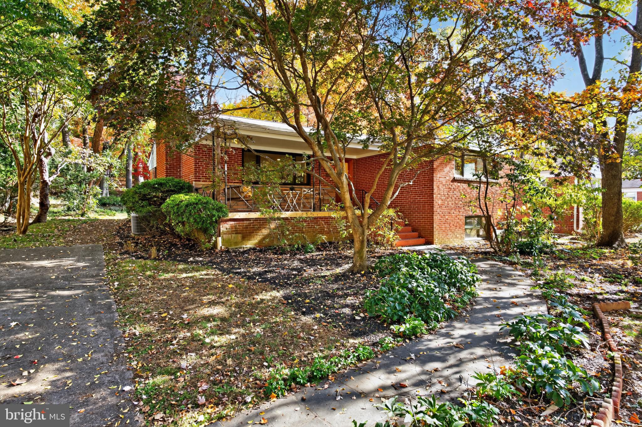 10407 Royal Road Silver Spring, MD 20903 - Photo 3 of 33 a front view of a house with a yard