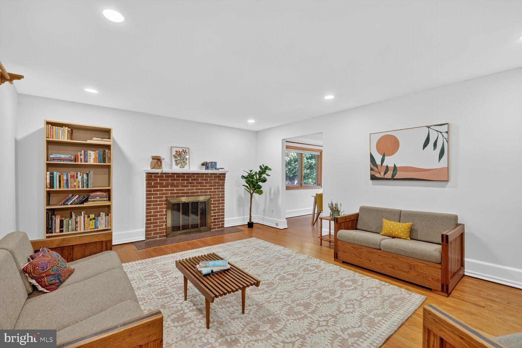 10407 Royal Road Silver Spring, MD 20903 - Photo 7 of 33 a living room with furniture and a fireplace