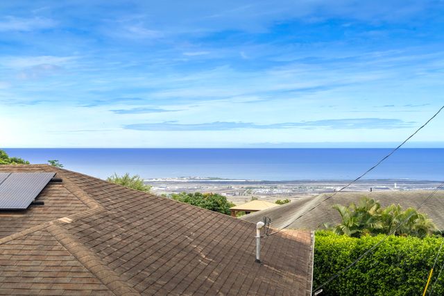 a view of an ocean from a balcony