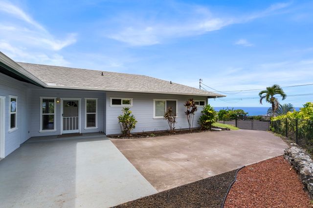 a front view of a house with a porch