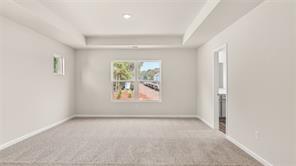 912 Stow Lane Monroe, GA 30655 - Photo 19 of 32 an empty room with windows