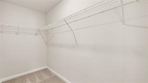 912 Stow Lane Monroe, GA 30655 - Photo 23 of 32 a view of a room with racks on the wall