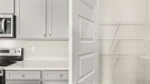 912 Stow Lane Monroe, GA 30655 - Photo 7 of 32 a close view of white cabinets