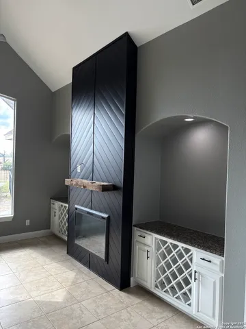 a living room with a fireplace