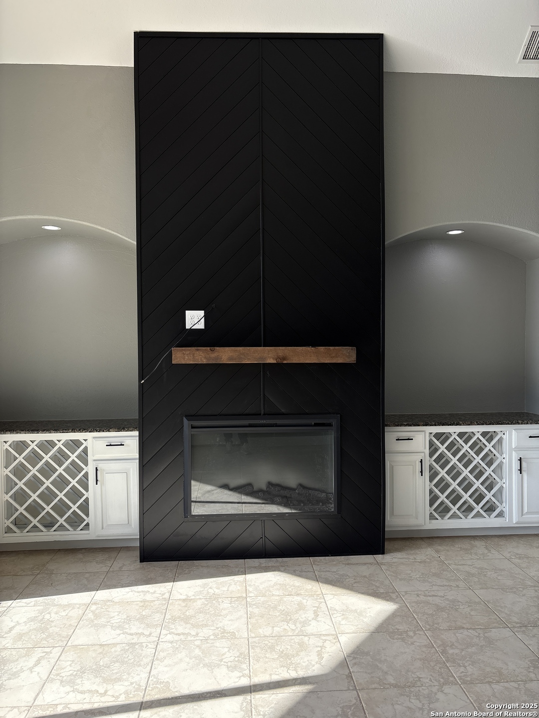 3022 Interstate 35 Natalia, TX 78059 - Photo 12 of 49 a living room with a fireplace